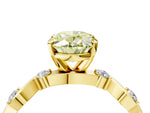 Fancy Yellow Oval Cut Diamond Solitaire Ring in Yellow gold with Twisted Ribbon Band and Round Accents_4