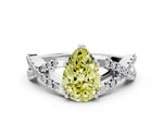 Fancy Yellow Pear Cut Diamond Solitaire Ring in Platinum with Interwoven Pavé Band and Prong Setting_6