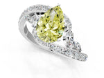 Fancy Yellow Pear Cut Diamond Solitaire Ring in White gold with Pavé Twist Band and Prong Setting_1