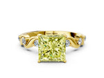 Fancy Yellow Princess Cut Diamond Solitaire Ring in Yellow gold with Twisted Ribbon Band and Round Accents