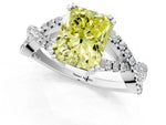 Fancy Yellow Radiant Cut Diamond Solitaire Ring in White gold with Interwoven Pavé Band and Prong Setting_1