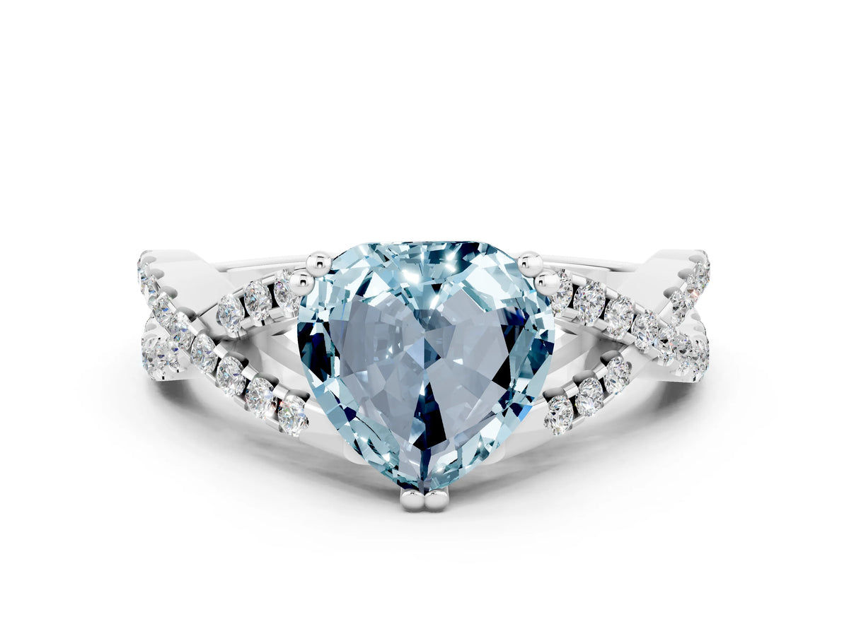 Heart Cut Aquamarine Solitaire Ring in White gold with Interwoven Pavé Band and Prong Setting