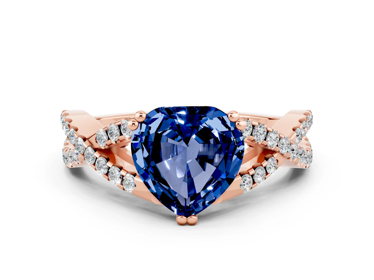 Heart Cut Blue Sapphire Solitaire Ring in Rose gold with Interwoven Pavé Band and Prong Setting