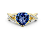 Heart Cut Blue Sapphire Solitaire Ring in Yellow gold with Interwoven Pavé Band and Prong Setting