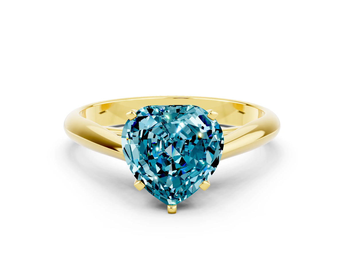 Heart Cut Blue Topaz Cathedral Solitaire Engagement Ring in Yellow gold with Prong Setting