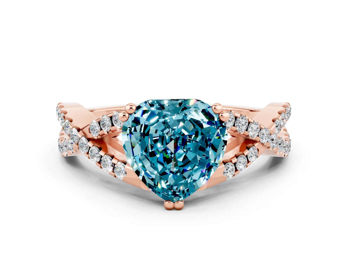 Heart Cut Blue Topaz Solitaire Ring in Rose gold with Interwoven Pavé Band and Prong Setting