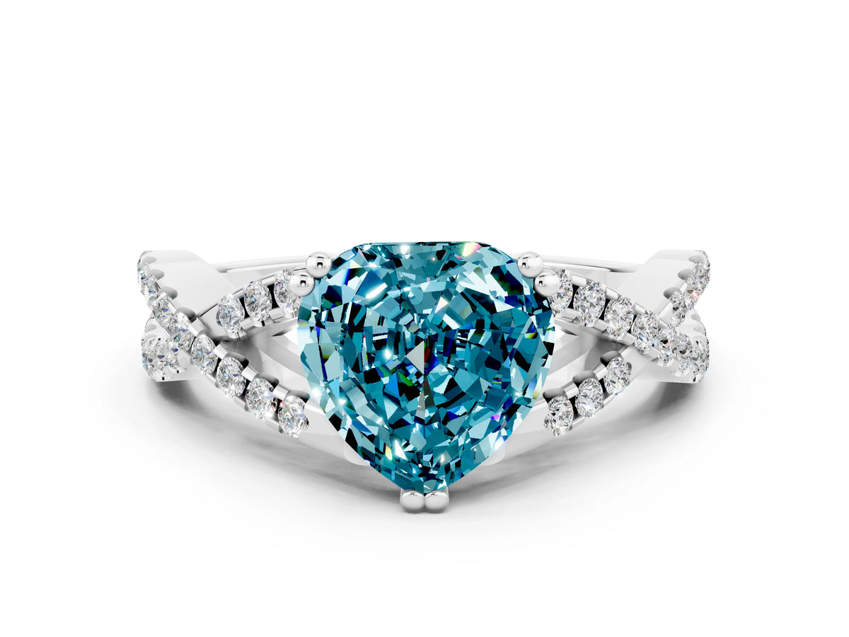 Heart Cut Blue Topaz Solitaire Ring in White gold with Interwoven Pavé Band and Prong Setting