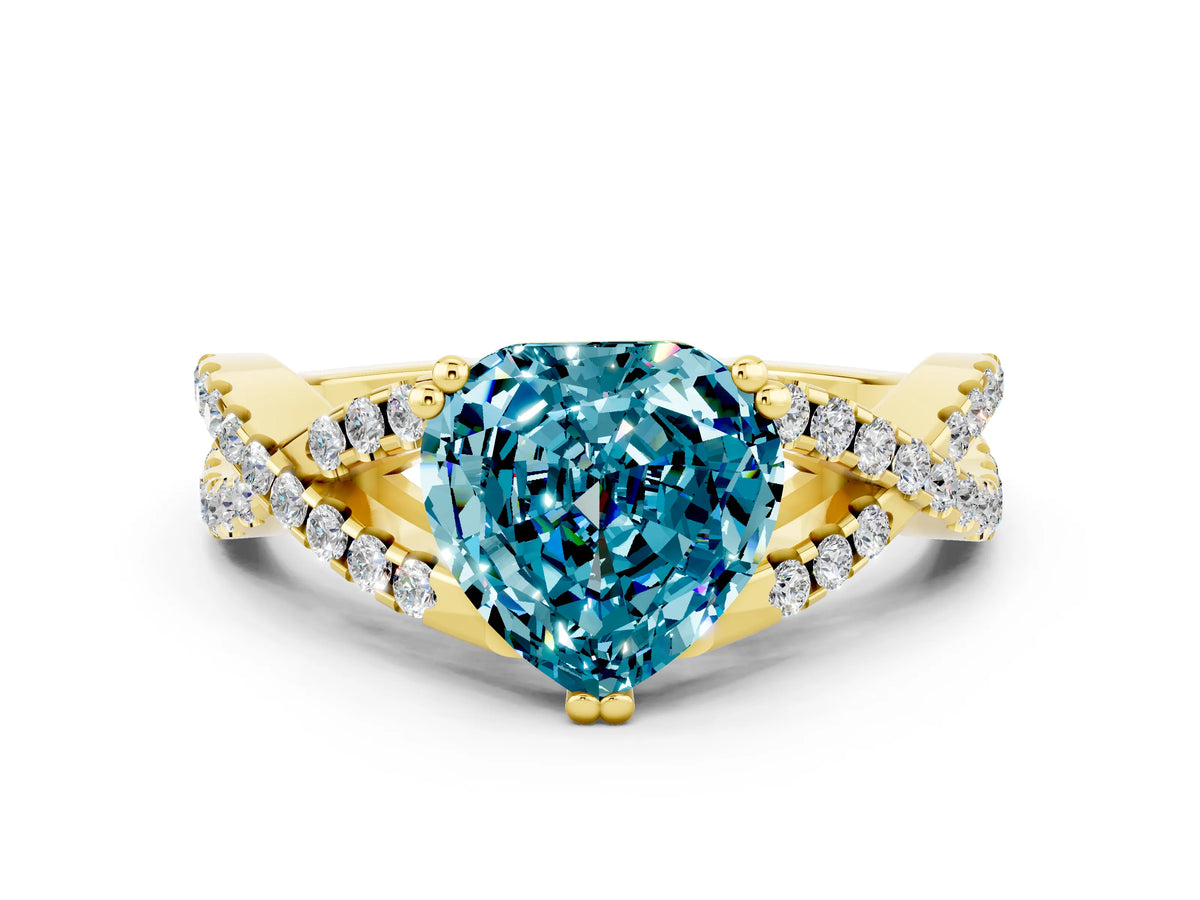 Heart Cut Blue Topaz Solitaire Ring in Yellow gold with Interwoven Pavé Band and Prong Setting