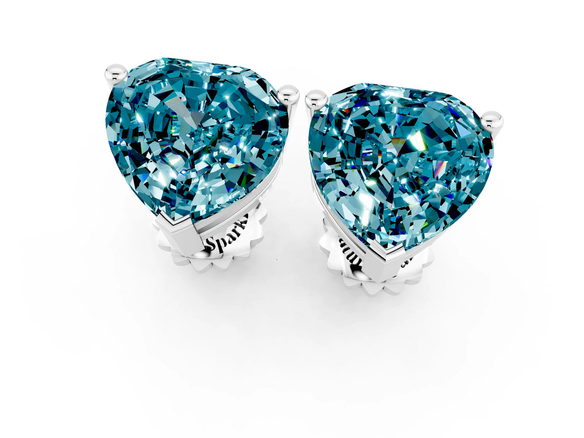 Heart Cut Blue Topaz Stud Earrings in White gold with Basket Setting_1