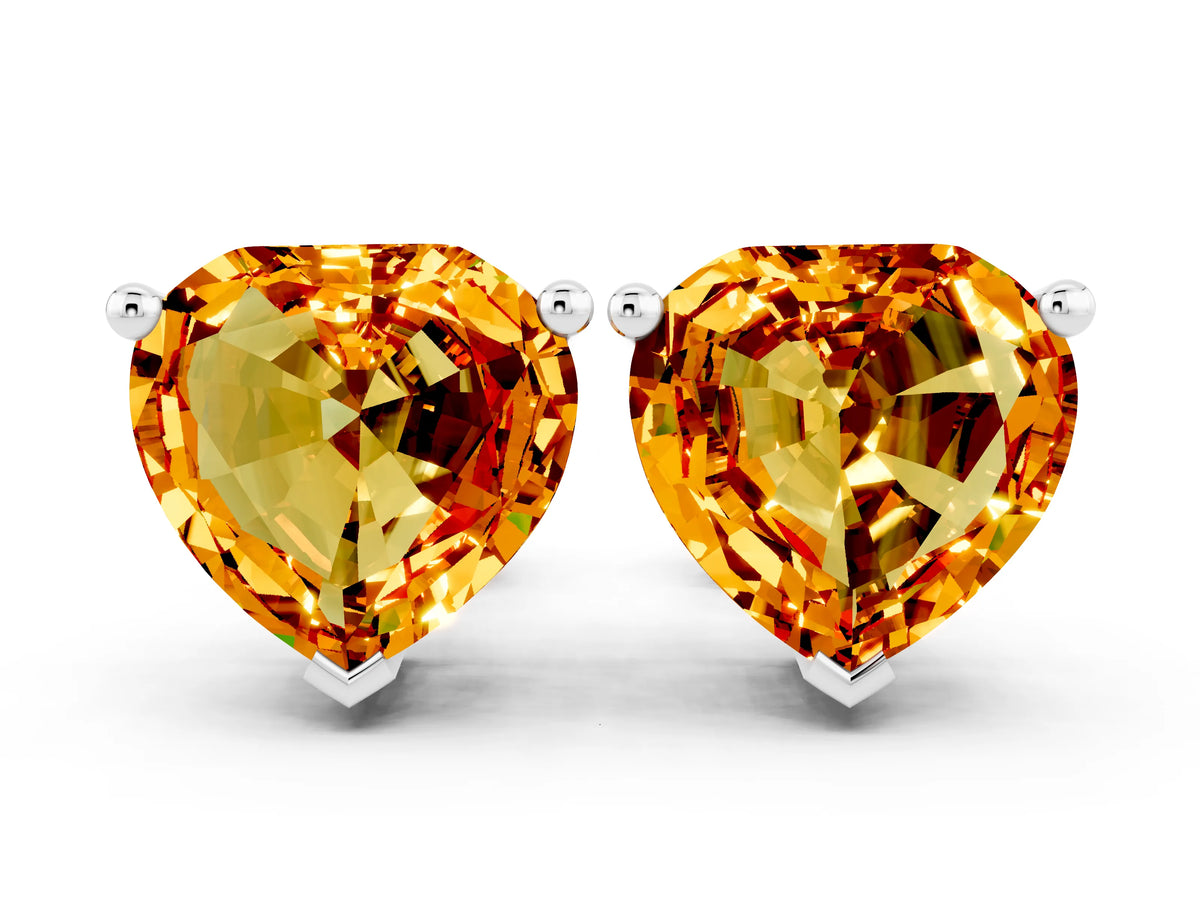Heart Cut Citrine Stud Earrings in White gold with Basket Setting
