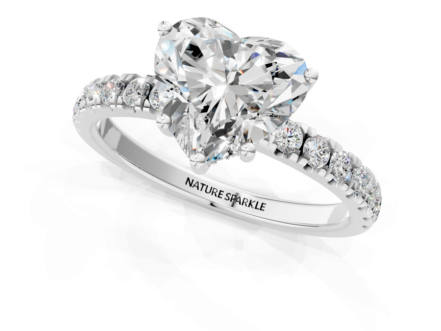 Heart Cut Diamond Hidden Halo Engagement Ring in White gold with Round Pavé Band