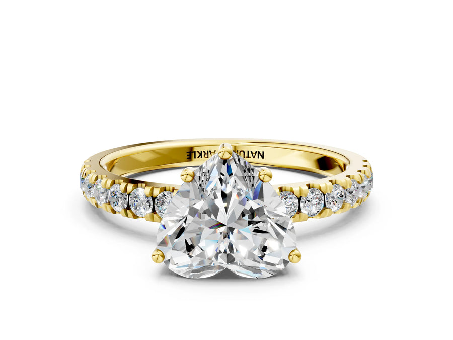 Heart Cut Diamond Hidden Halo Engagement Ring in Yellow gold with Round Pavé Band