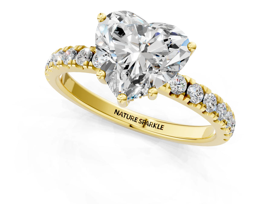 Heart Cut Diamond Hidden Halo Engagement Ring in Yellow gold with Round Pavé Band