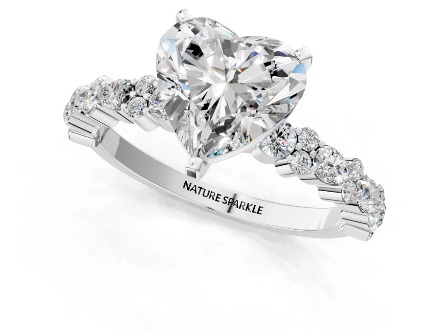 Heart Cut Diamond Solitaire Ring in Silver with Pear and Round Cluster Band