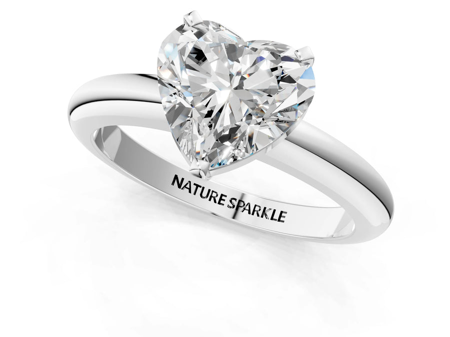 Heart Cut Diamond Solitaire Ring in Platinum with Prong Setting and Rounded Band