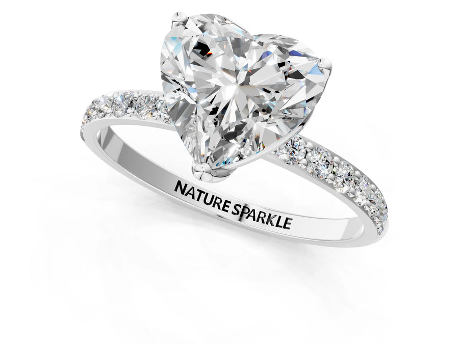 Heart Cut Diamond Solitaire Ring in Platinum with Round Shared Prong Pavé Band