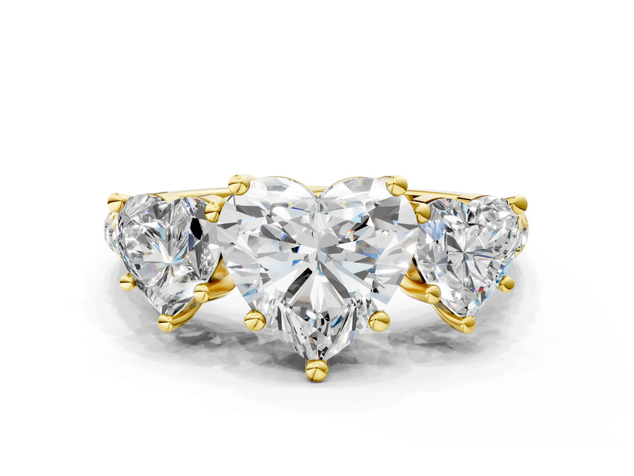 Heart Cut Diamond Trellis Three-Stone Engagement Ring in Yellow gold with Round Side Stones