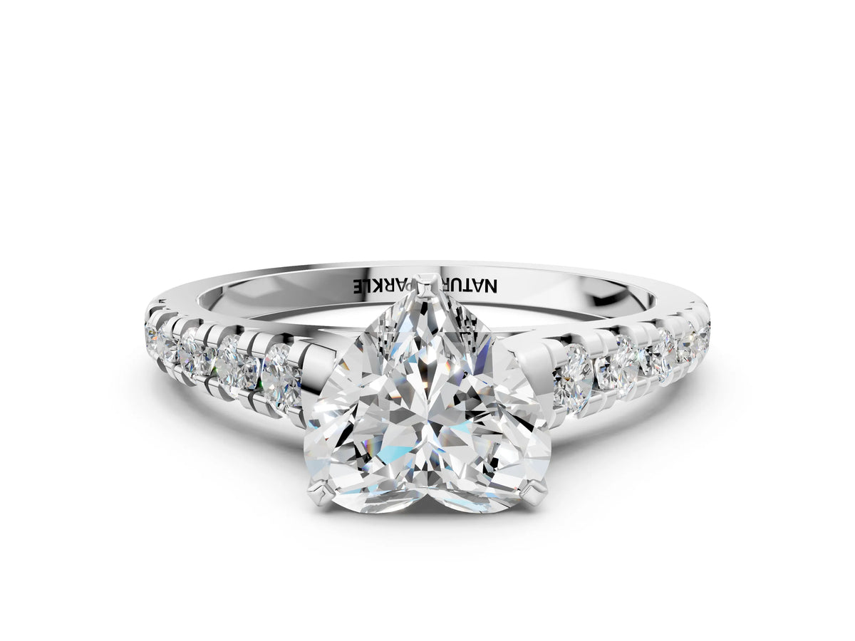 Heart Cut Diamond Vintage Scroll Solitaire Ring in White gold with Graduated Round Side Stones_18