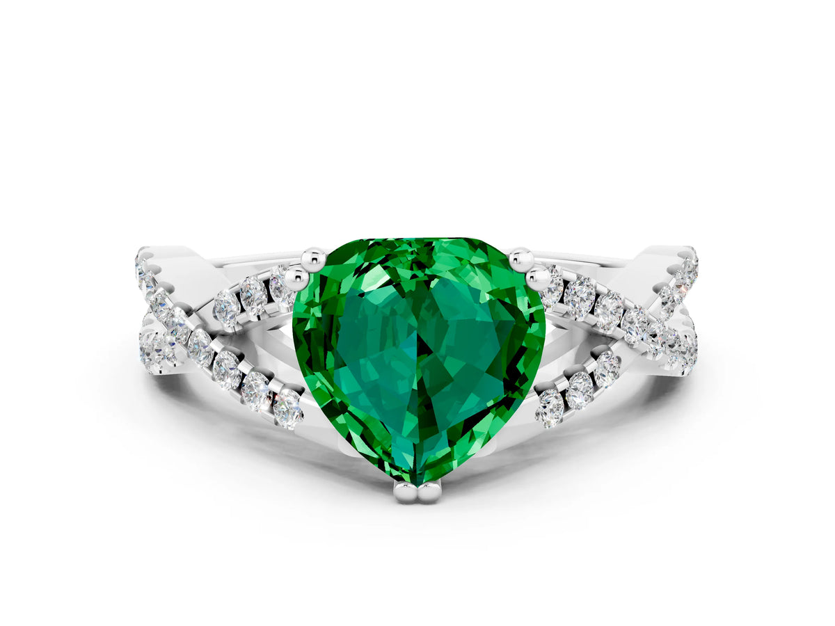 Heart Cut Emerald Solitaire Ring in White gold with Interwoven Pavé Band and Prong Setting