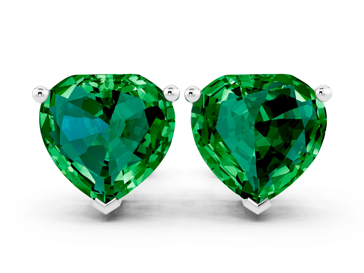 Heart Cut Emerald Stud Earrings in White gold with Basket Setting