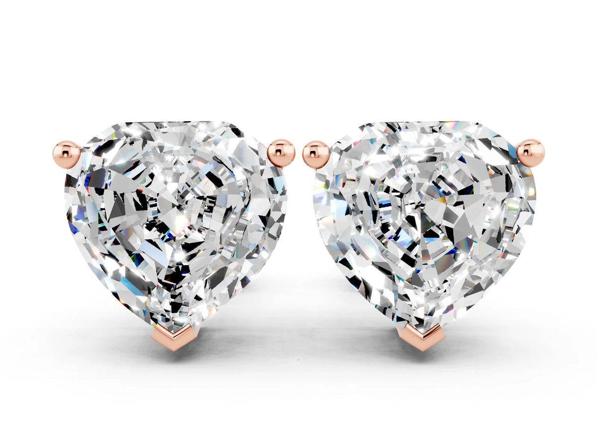 Heart Cut Moissanite Stud Earrings in Rose gold with Basket Setting