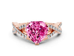 Heart Cut Pink Sapphire Solitaire Ring in Rose gold with Interwoven Pavé Band and Prong Setting