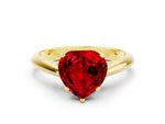 Heart Cut Ruby Cathedral Solitaire Engagement Ring in Yellow gold with Prong Setting