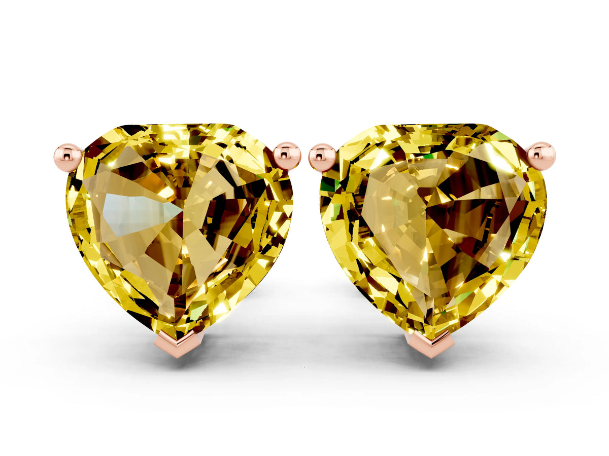 Heart Cut Yellow Sapphire Stud Earrings in Rose gold with Basket Setting