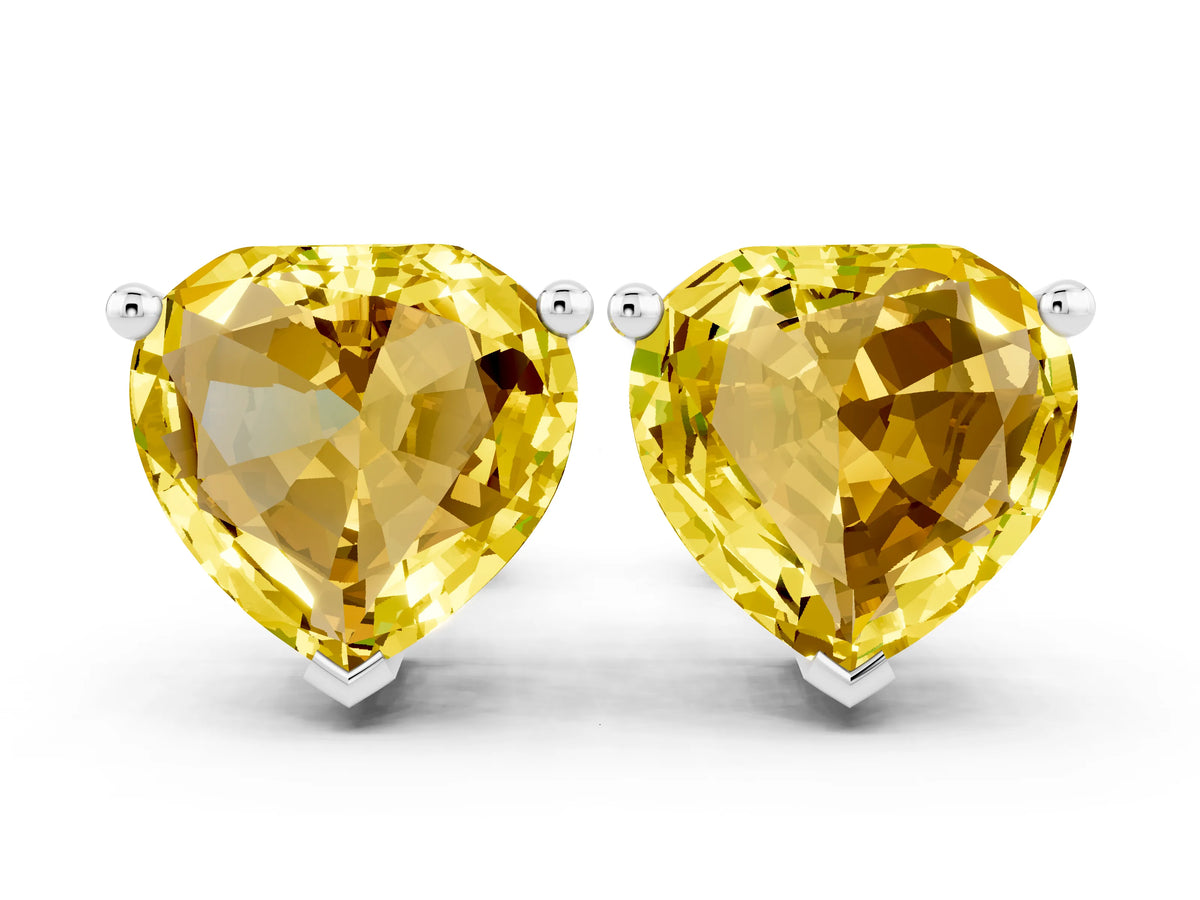 Heart Cut Yellow Sapphire Stud Earrings in White gold with Basket Setting