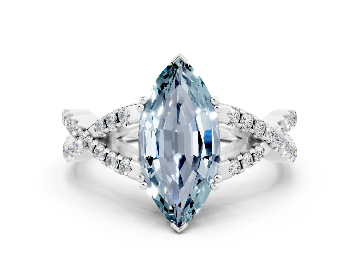 Marquise Cut Aquamarine Solitaire Ring in White gold with Interwoven Pavé Band and Prong Setting