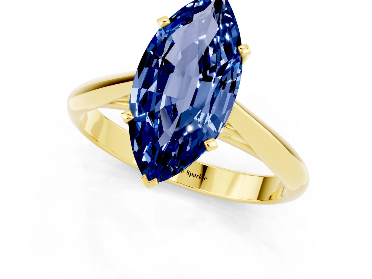 Marquise Cut Blue Sapphire Cathedral Solitaire Engagement Ring in Yellow gold with Prong Setting_1
