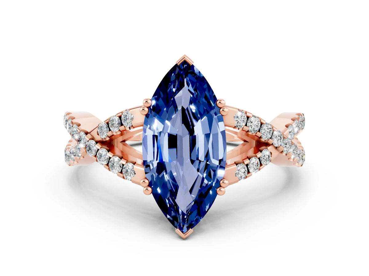 Marquise Cut Blue Sapphire Solitaire Ring in Rose gold with Interwoven Pavé Band and Prong Setting