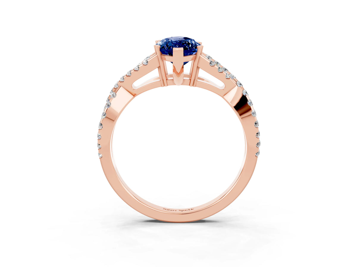 Marquise Cut Blue Sapphire Solitaire Ring in Rose gold with Interwoven Pavé Band and Prong Setting_3