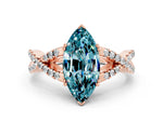 Marquise Cut Blue Topaz Solitaire Ring in Rose gold with Interwoven Pavé Band and Prong Setting