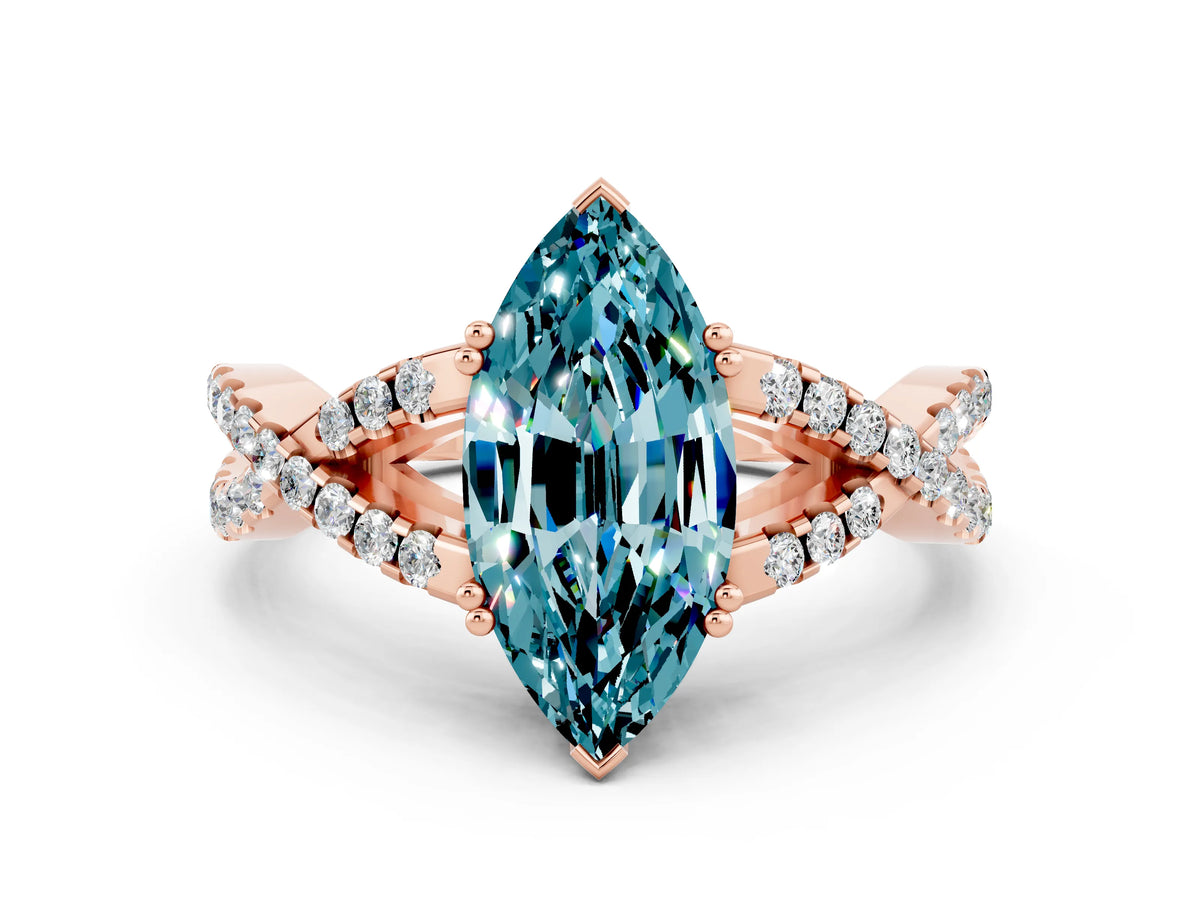Marquise Cut Blue Topaz Solitaire Ring in Rose gold with Interwoven Pavé Band and Prong Setting