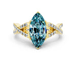 Marquise Cut Blue Topaz Solitaire Ring in Yellow gold with Interwoven Pavé Band and Prong Setting
