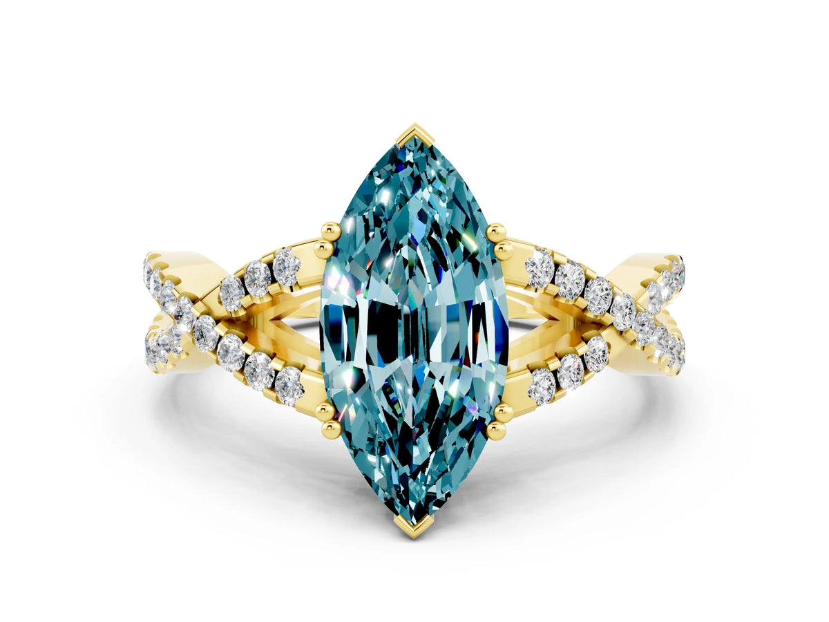 Marquise Cut Blue Topaz Solitaire Ring in Yellow gold with Interwoven Pavé Band and Prong Setting