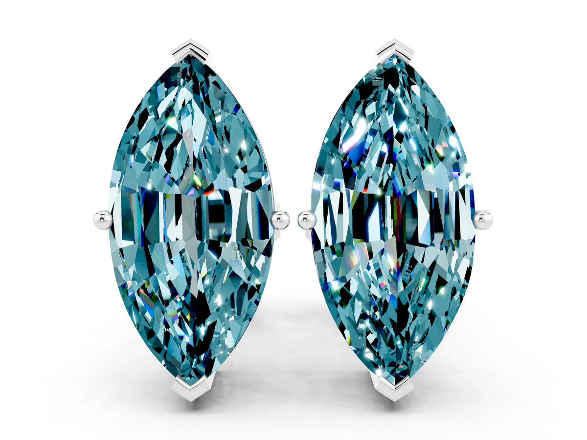 Marquise Cut Blue Topaz Stud Earrings in White gold with Basket Setting