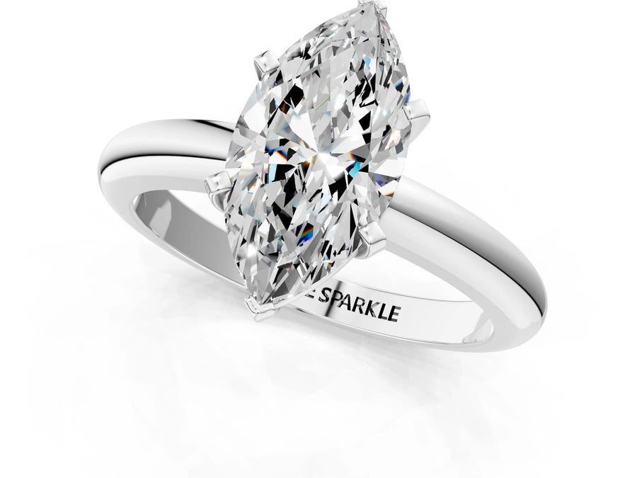 Marquise Cut Diamond Solitaire Ring in Platinum with Prong Setting and Rounded Band