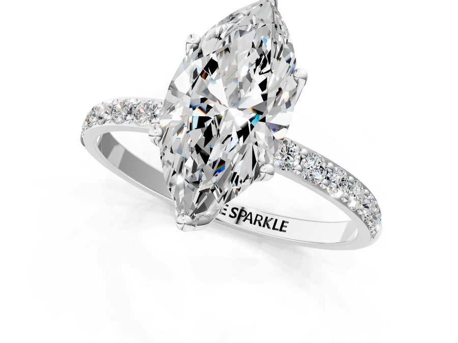 Marquise Cut Diamond Solitaire Ring in White gold with Round Shared Prong Pavé Band
