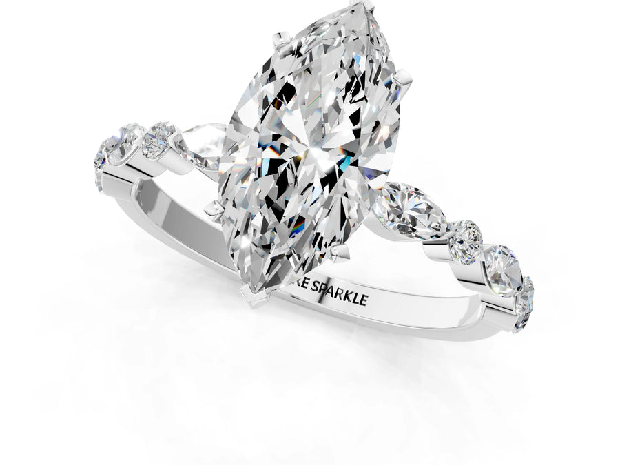 Marquise Cut Diamond Solitaire Ring in White gold with Shared Prong Marquise and Round Side Stones