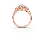 Marquise Cut Diamond Trellis Three-Stone Engagement Ring in Rose gold with Round Side Stones_21
