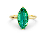 Marquise Cut Emerald Cathedral Solitaire Engagement Ring in Yellow gold with Prong Setting