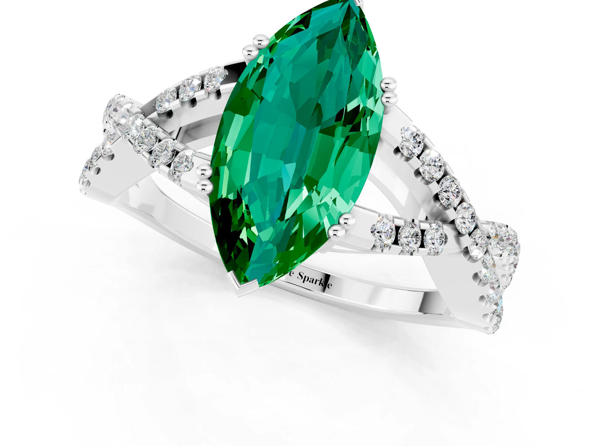 Marquise Cut Emerald Solitaire Ring in Platinum with Interwoven Pavé Band and Prong Setting_7