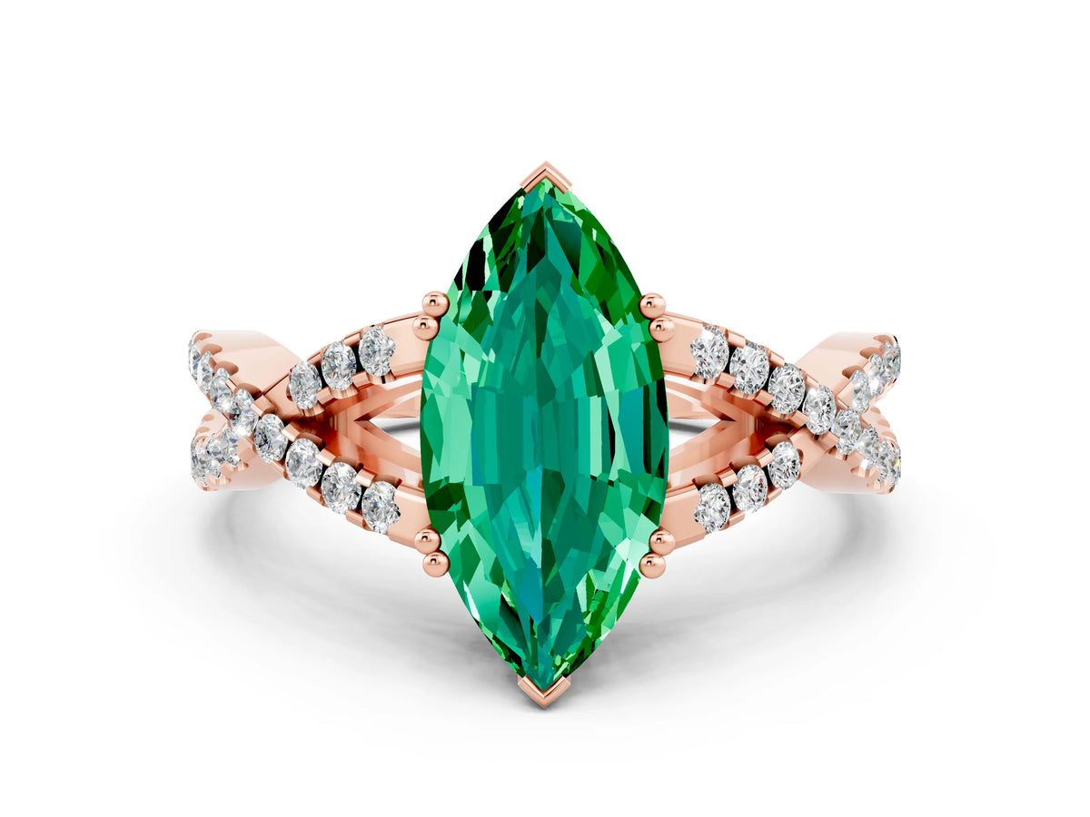 Marquise Cut Emerald Solitaire Ring in Rose gold with Interwoven Pavé Band and Prong Setting
