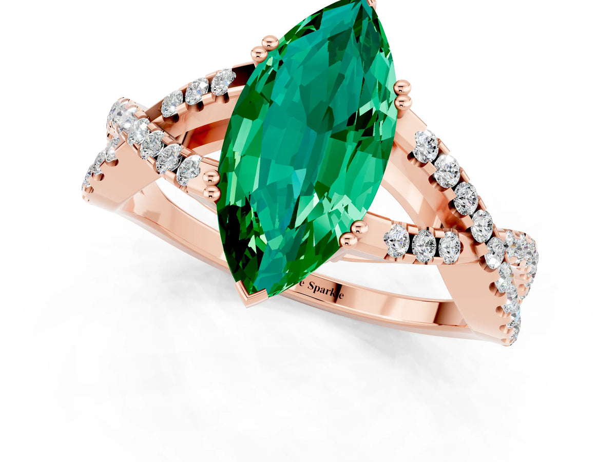 Marquise Cut Emerald Solitaire Ring in Rose gold with Interwoven Pavé Band and Prong Setting_1