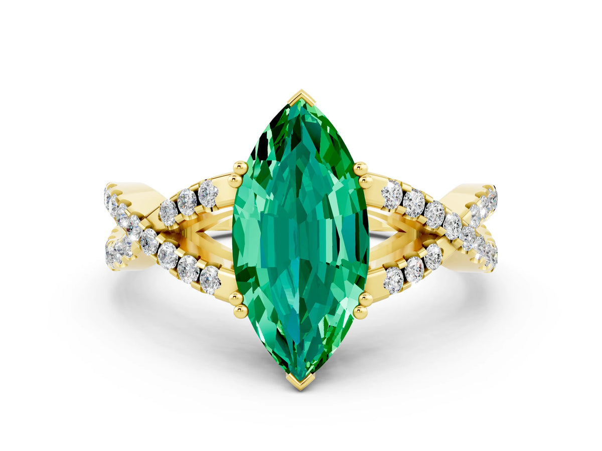 Marquise Cut Emerald Solitaire Ring in Yellow gold with Interwoven Pavé Band and Prong Setting