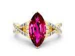 Marquise Cut Garnet Solitaire Ring in Yellow gold with Interwoven Pavé Band and Prong Setting