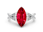 Marquise Cut Ruby Solitaire Ring in White gold with Interwoven Pavé Band and Prong Setting