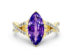 Marquise Cut Tanzanite Solitaire Ring in Yellow gold with Interwoven Pavé Band and Prong Setting